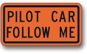Pilot car follow me sign