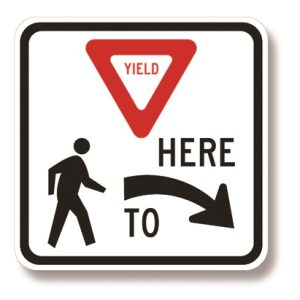 Yield here to pedestrians (right arrow)