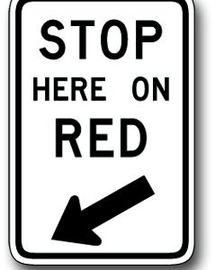 Stop here on red sign