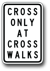Cross only at cross walks sign