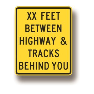 Storage space XX feet between highway & tracks behind you sign